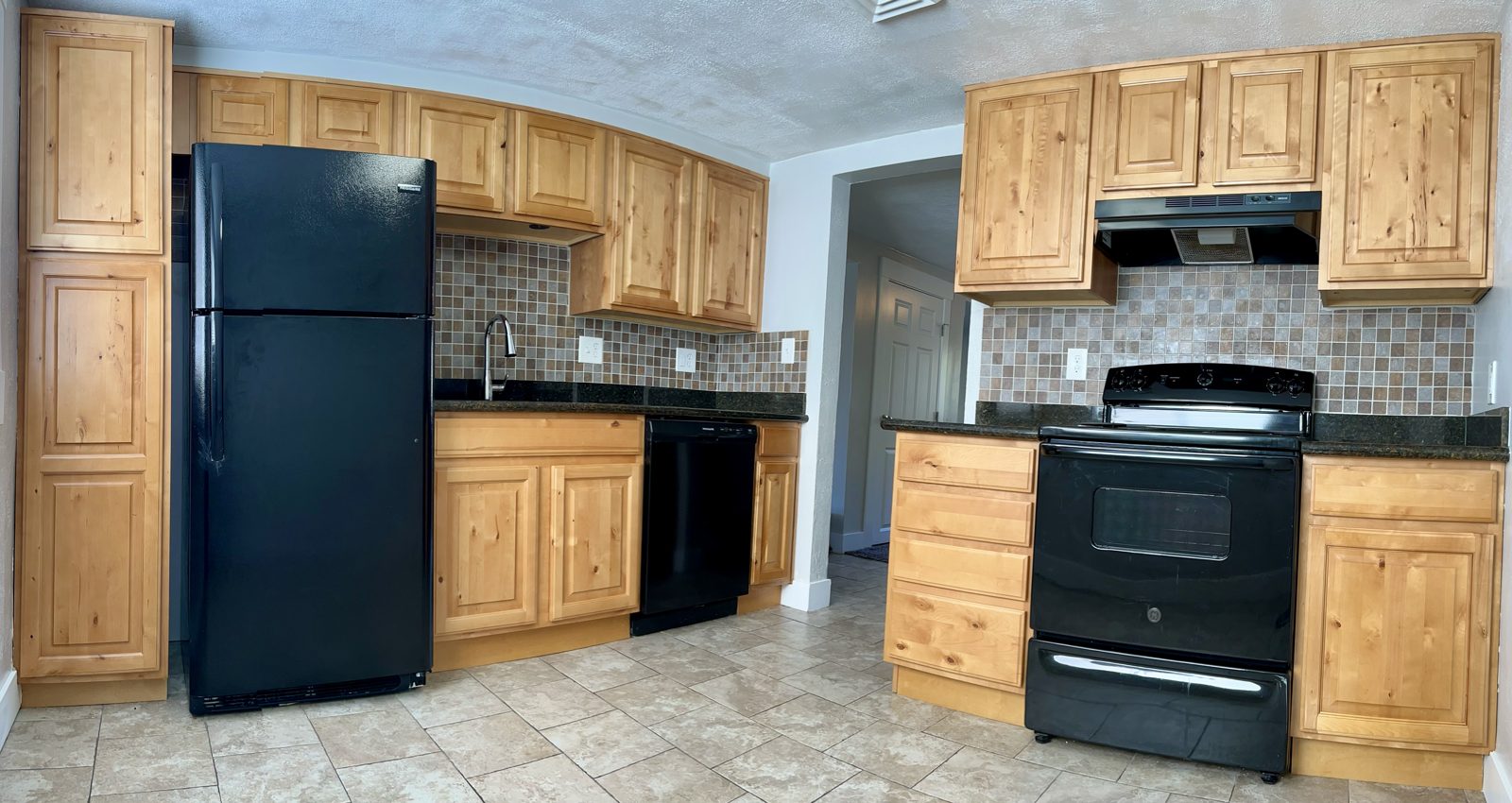 Renovated kitchen with modern appliances